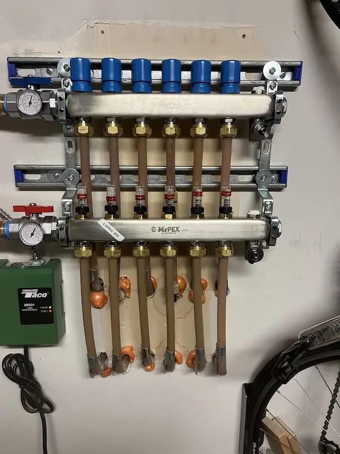 Plumber performing Water Heater Repair at a residential property in Spokane Valley